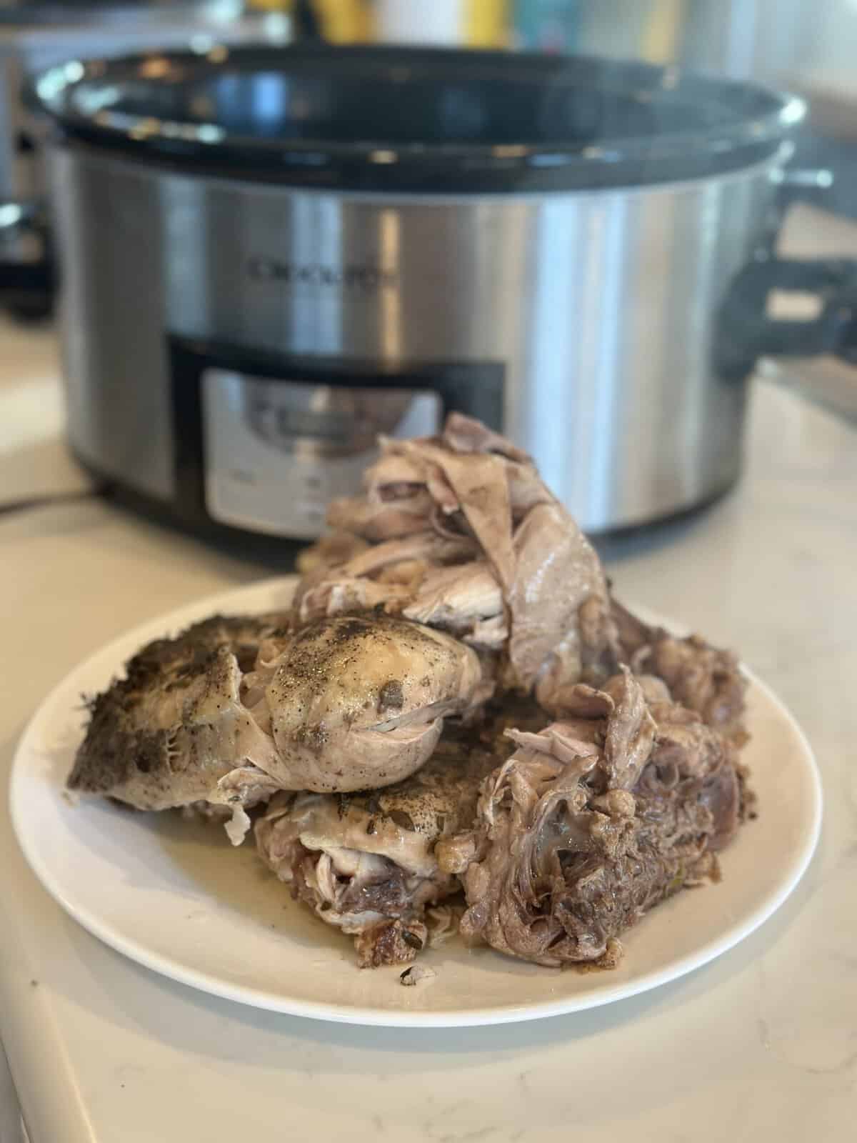 Slow-cooker shredded chicken piled on a platter