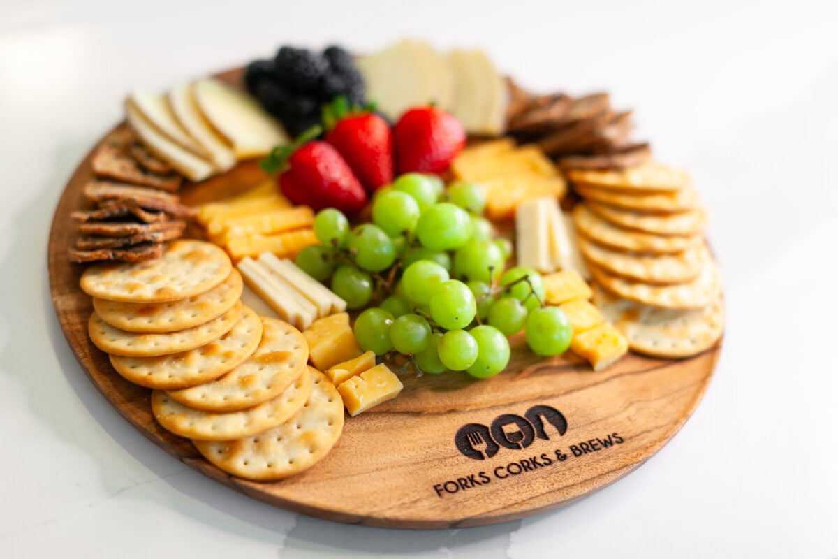 Cheese and cracker board with fruit